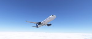 An aircraft cruises beneath a clear blue sky, captured from a distant, slightly elevated perspective with the wings fully extended.