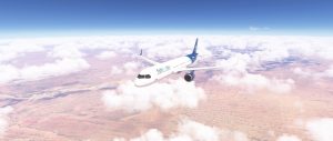 An Airbus A321neo cruises above scattered clouds, seen from an external view with bright desert-toned terrain far below under a clear blue sky, capturing the calm en-route phase of the planned DNMM to LKPR flight.